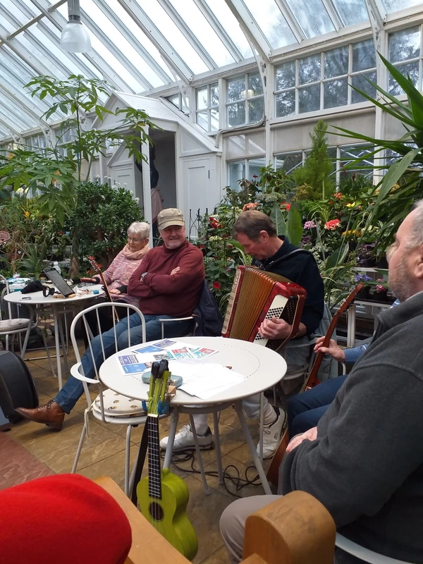 Man playing accordion music in Conservatory